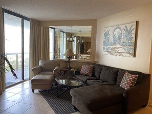 Relax in our spacious living room with a flat screen TV and comfy couch!