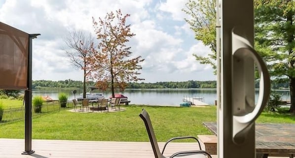 View of Lake & Deck Through Glass Slider