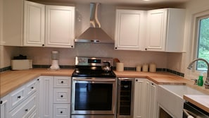 New Kitchen with farmhouse sink and SS appliances