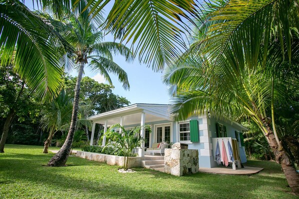 Touchstone's Cottage nestled amongst the coconut palms.