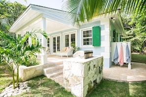 Front Patio with Built-in native Bahamian stone Grill area and outdoor shower