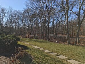 One and a half acre, on a quiet street, just 3 minutes from town or beaches.