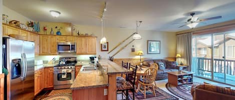 Living room with nearby kitchen: Truckee Cinnabar Vacation Retreat