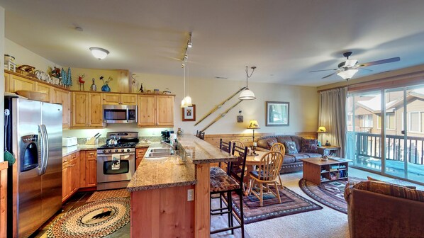 Living room with nearby kitchen: Truckee Cinnabar Vacation Retreat