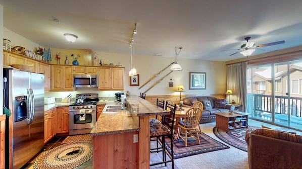 Living room with nearby kitchen: Truckee Cinnabar Vacation Retreat