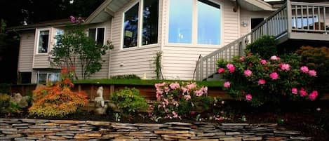 Beautiful Agate Beach House from professionally landscaped backyard