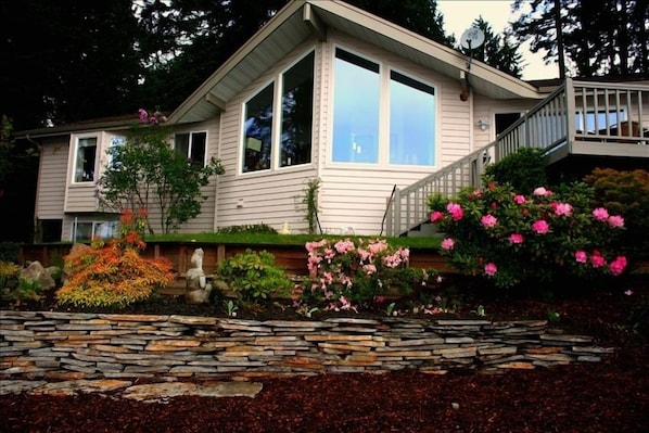 Beautiful Agate Beach House from professionally landscaped backyard