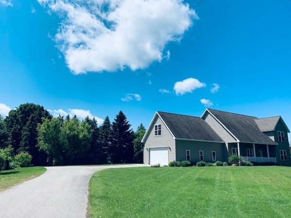 Front of the house with 3 cars garage