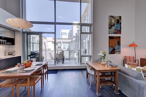 Floor to Ceiling Windows in this historic 2 bedroom 2 bath loft! 