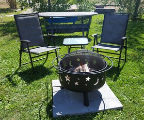 The fire pit is warm & cozy at any time of day or night. We supply the firewood