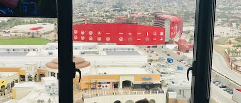 Living room w View of the Xolos/Caliente Stadium, Casino, racetrack, mall & city