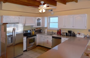 Well-equipped kitchen with stainless steel appliances