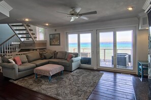 Open concept living area steps right outside to a large deck.