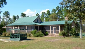 Farm House back with screened-in porches