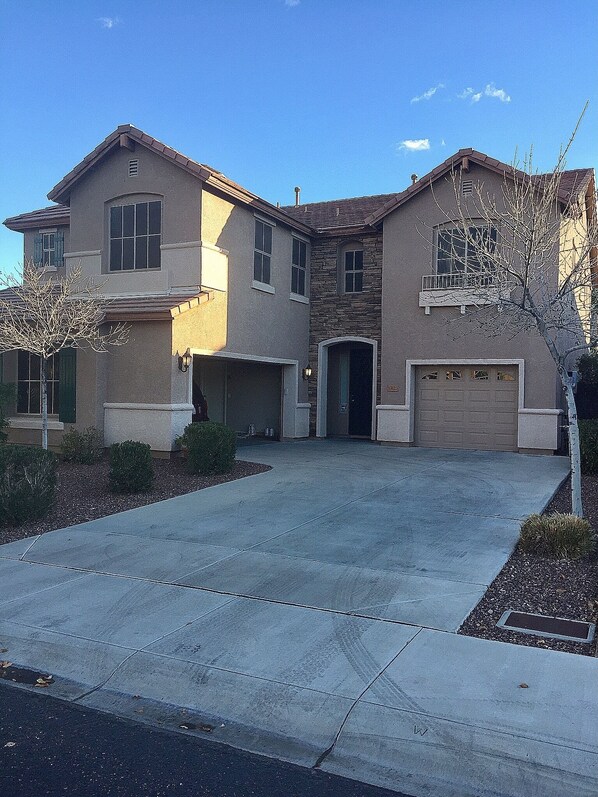 Front View, great neighborhood, park across the street in green space. 