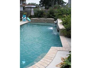 owner's backyard pool and spa, available for use by pre-arrangement with owner