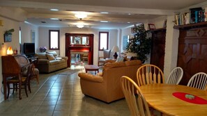 living room and desk view from dining area