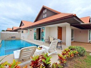 Private pool villa with an easy access to cozy living area.