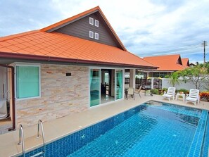 Private pool villa with an easy access to cozy living area.