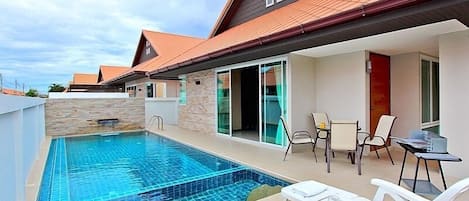 Private pool villa with an easy access to cozy living area.