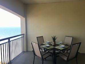 Cozy protected outside dining.with afternoon shade