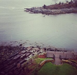 View of the shorefront deck from the second floor master bedroom