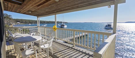 Uninterrupted 180 degree water front views with shared private jetty.