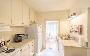 Well stocked, period style kitchen. Granite counters.
