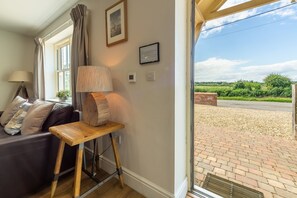 Ground floor: Located on a quiet lane overlooking open countryside