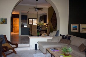 Open concept between living room, dining room and kitchen