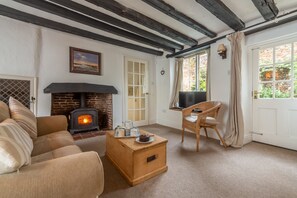 Ground floor: Sitting room has wood-burning stove