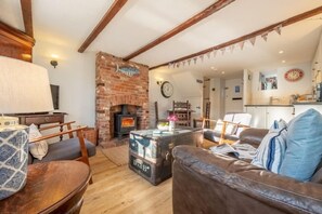 Ground floor: Sitting area with a log burner and plenty of seating