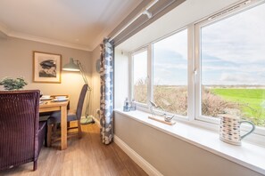 Ground floor: Dining area with views over the playing field