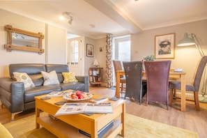 Ground floor: The bright sitting room with dining area