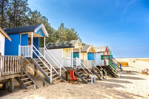 Holly Cottage, Wells-next-the-Sea: The colourful beach huts at Wells beach