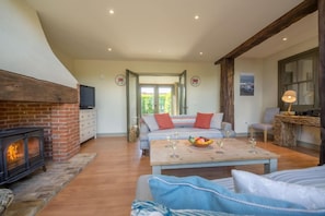 Ground floor: Sitting room with wood burning stove