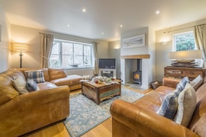 Caddows, Docking: Sitting room with wood burning stove