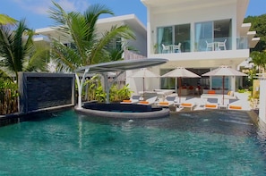 The villas pool has a water jet system, underwater seating with Jacuzzi jets