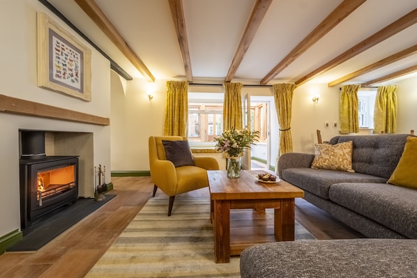 Mill House Cottage: A cosy sitting room awaits