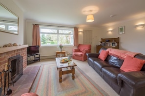 Ground floor: Sitting room with open fire