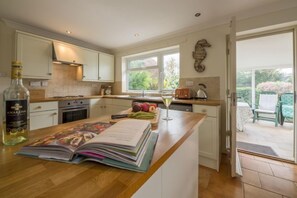 Ground floor: Kitchen leading to Conservatory