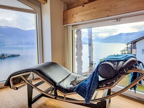 Furniture, Interior Design, Chair, Flooring, Apartment, Floor, Wood Flooring, Living Room, Hardwood, Chaise Longue