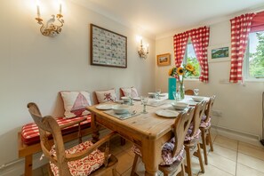 Saxon Shore Cottage, Burnham Deepdale: Dining area with seating for up to eight people