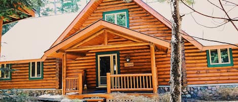 Beautiful 4,200 square foot custom log cabin on a secluded 3 acre lakefront lot.