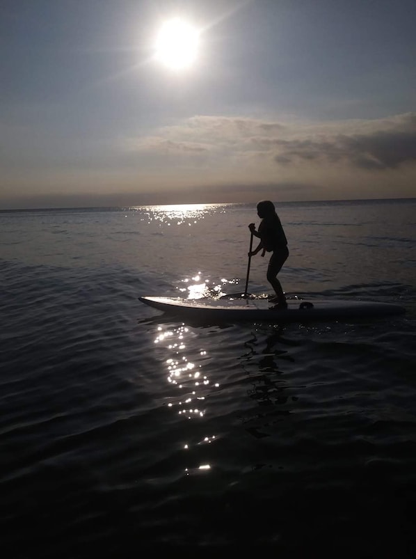 Learn to paddleboard while you are here.