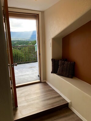 Door leading out to the upstairs balcony 