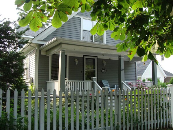 Welcome to Gate Street Cottage!  Come sit on our front porch and watch the world go by.