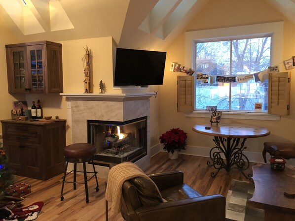 Upper Dining/Living area with Gas Fireplace w  Majestic Mtn Views 14 skylights