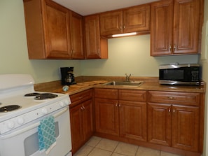 Brand new kitchen in "Seafoam" green apartment