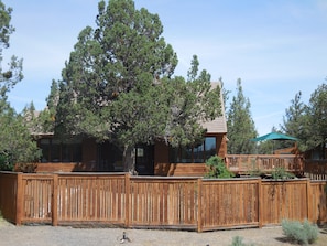 Front of the house from just outside the gate.  The deck is calling!